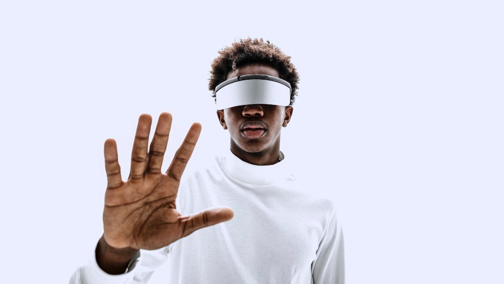 man wearing smart glasses touching virtual screen